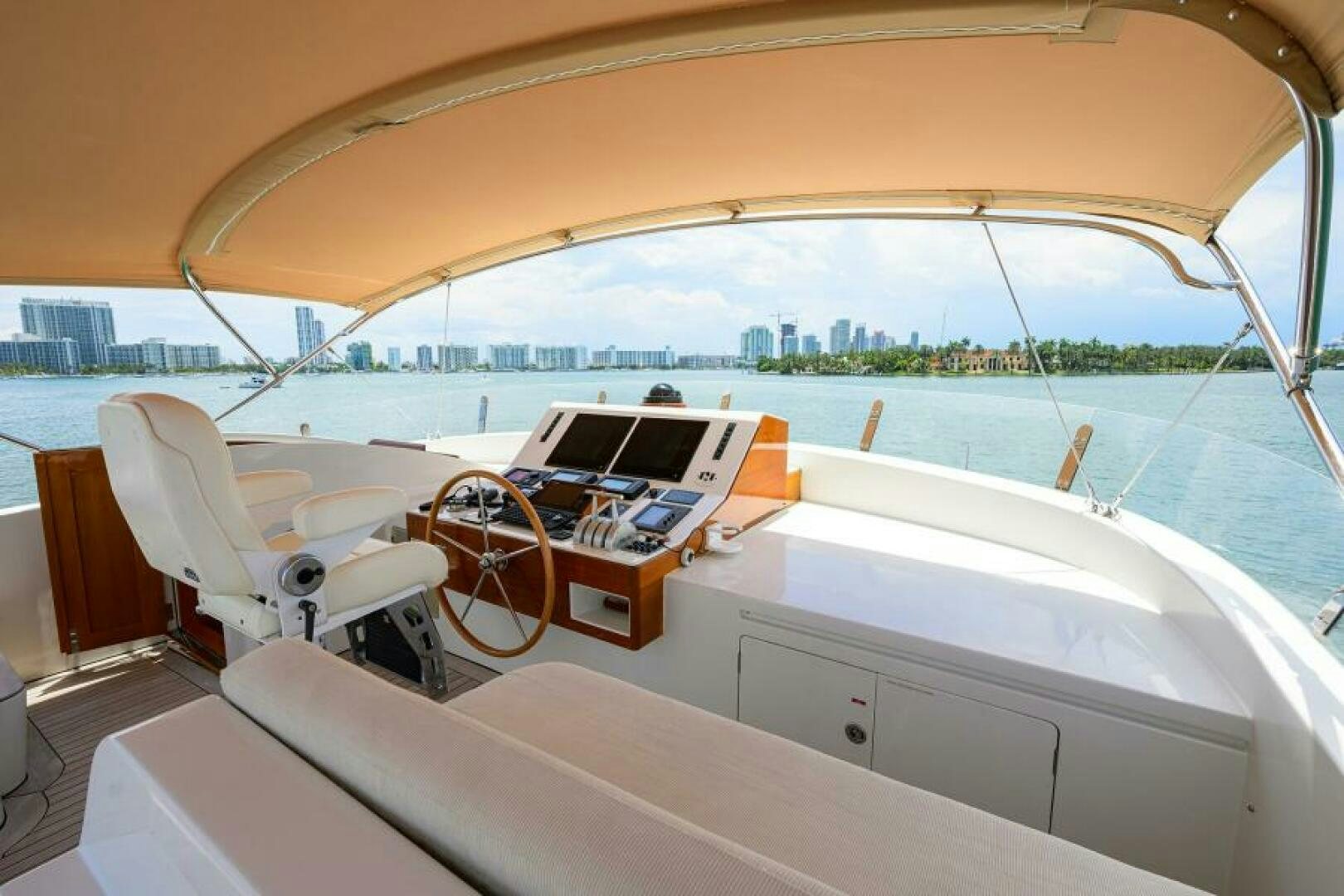 a boat with a table and chairs on it aboard ELECTRA Yacht for Sale