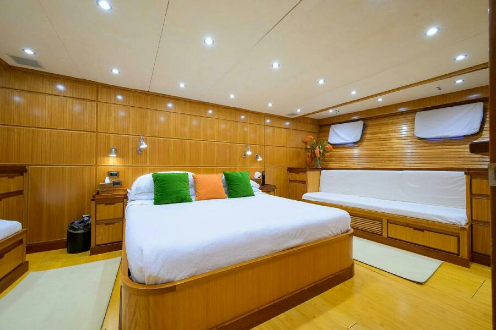a room with a bed and a desk aboard ELECTRA Yacht for Sale