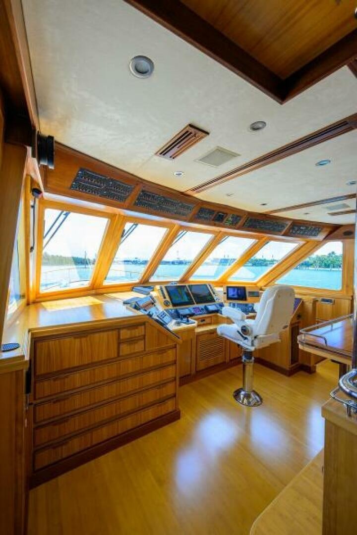 a room with a desk and a computer aboard ELECTRA Yacht for Sale