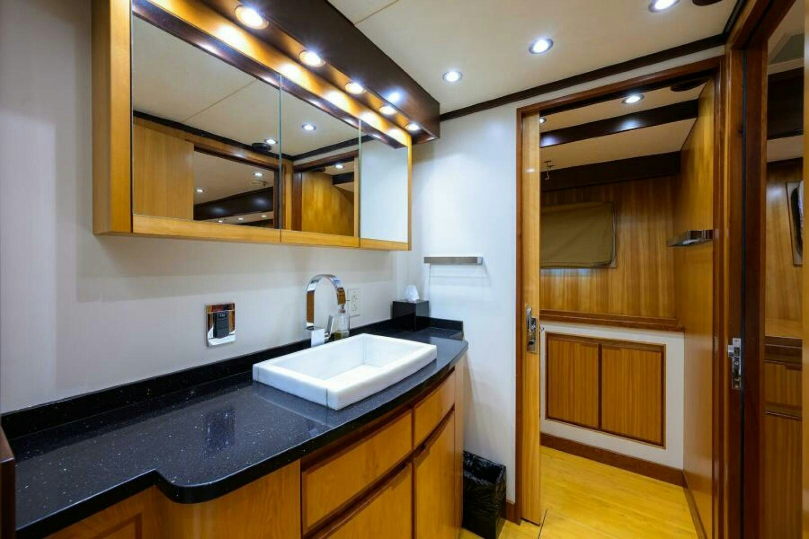 a kitchen with a sink and a mirror aboard ELECTRA Yacht for Sale