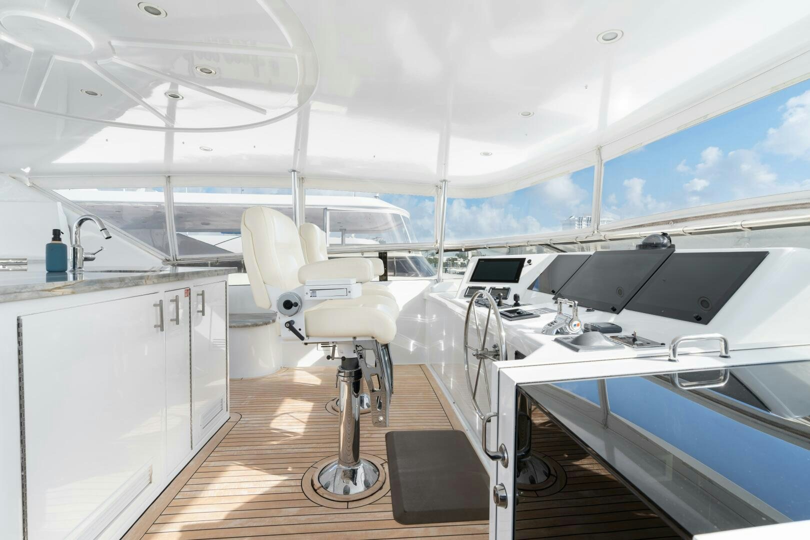 a room with a large white ceiling aboard INEVITABLE Yacht for Sale