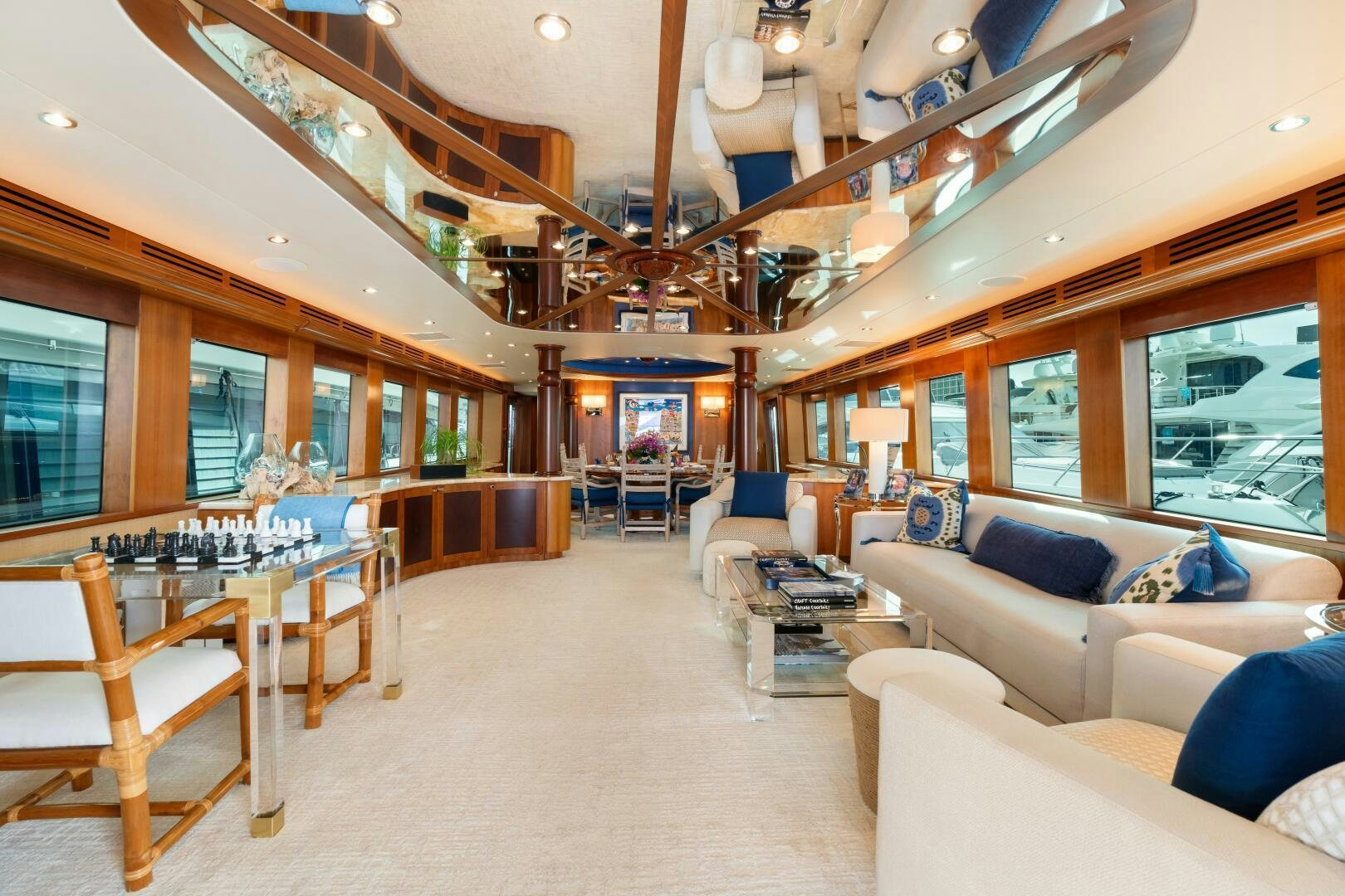 a large living room with a large open floor plan aboard INEVITABLE Yacht for Sale