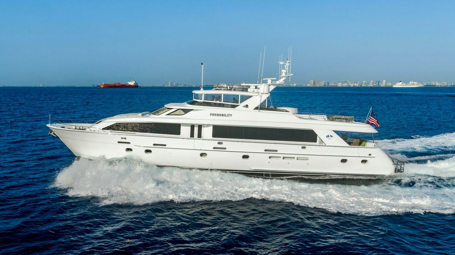 a large white yacht aboard INEVITABLE Yacht for Sale