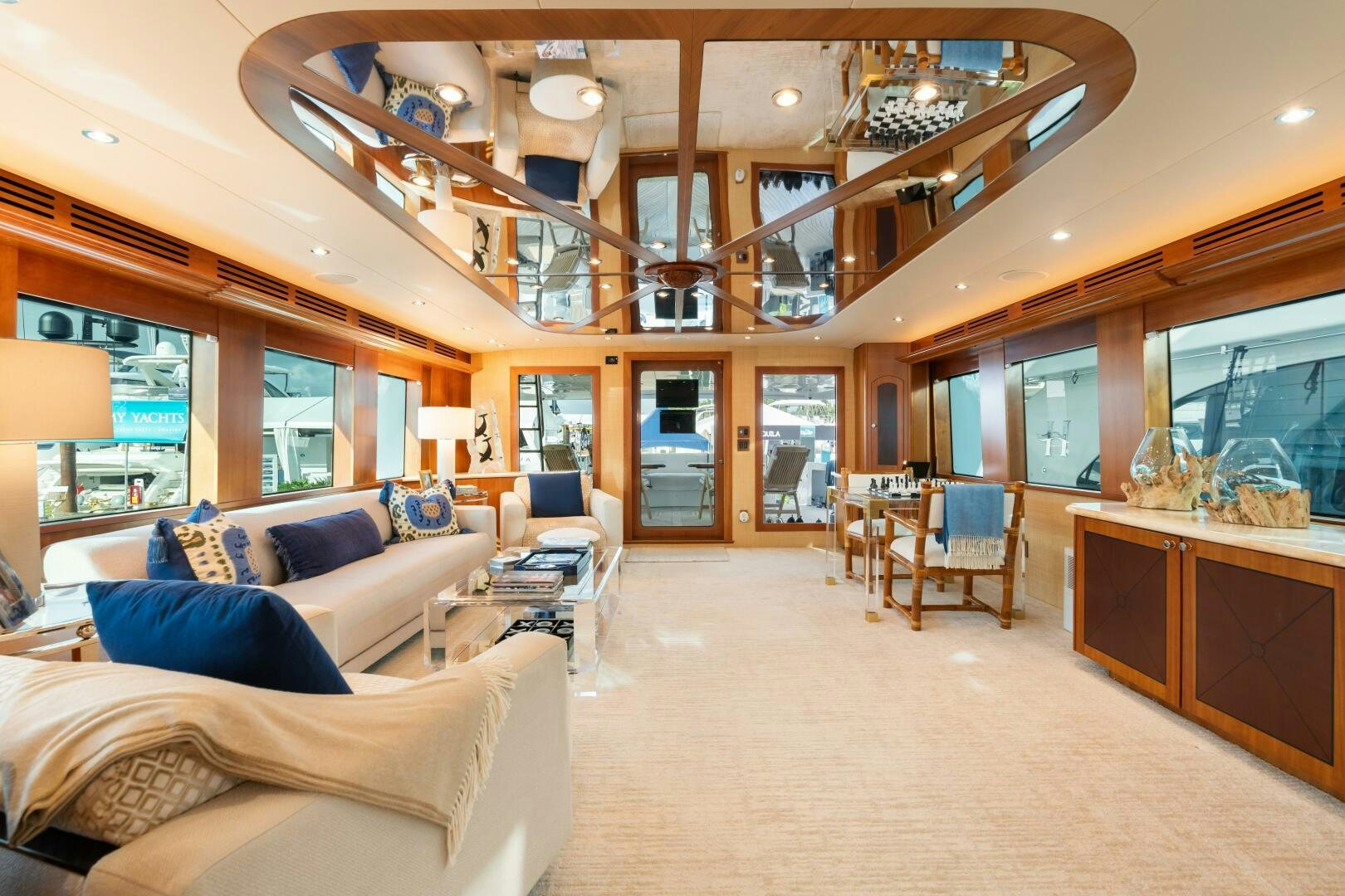 a living room with a large ceiling aboard INEVITABLE Yacht for Sale