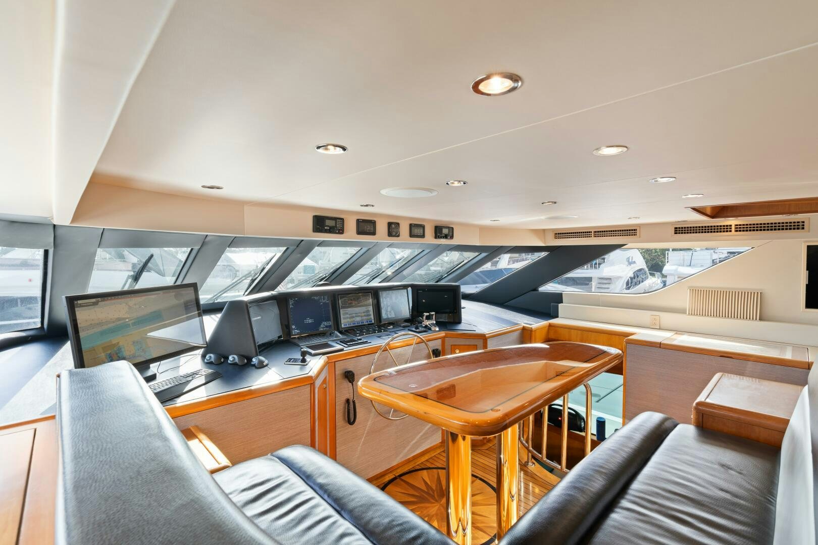inside of a building with computers aboard INEVITABLE Yacht for Sale