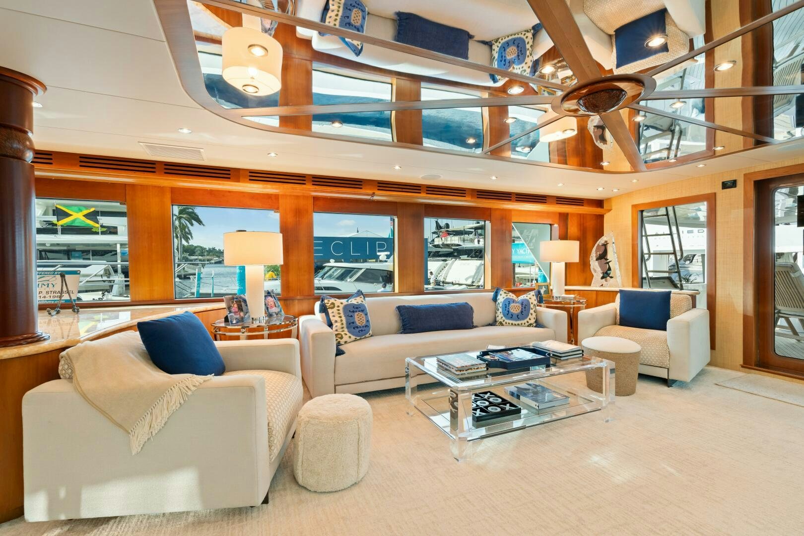 a living room with a large window aboard INEVITABLE Yacht for Sale
