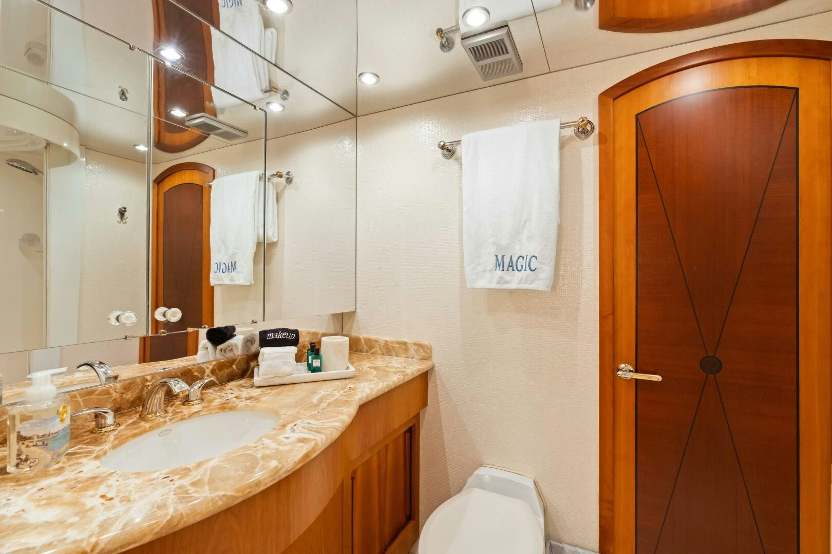 a bathroom with a sink and a toilet aboard INEVITABLE Yacht for Sale