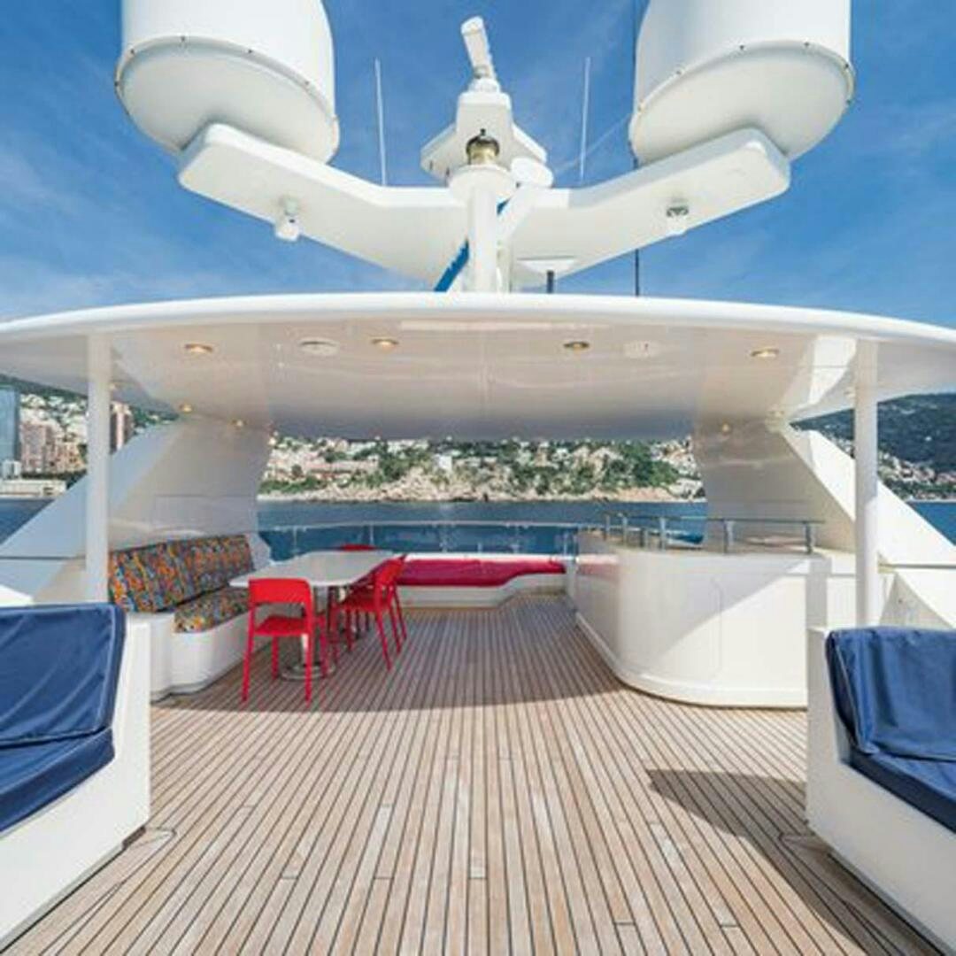 a large white airplane with chairs around it aboard IRAMA Yacht for Sale