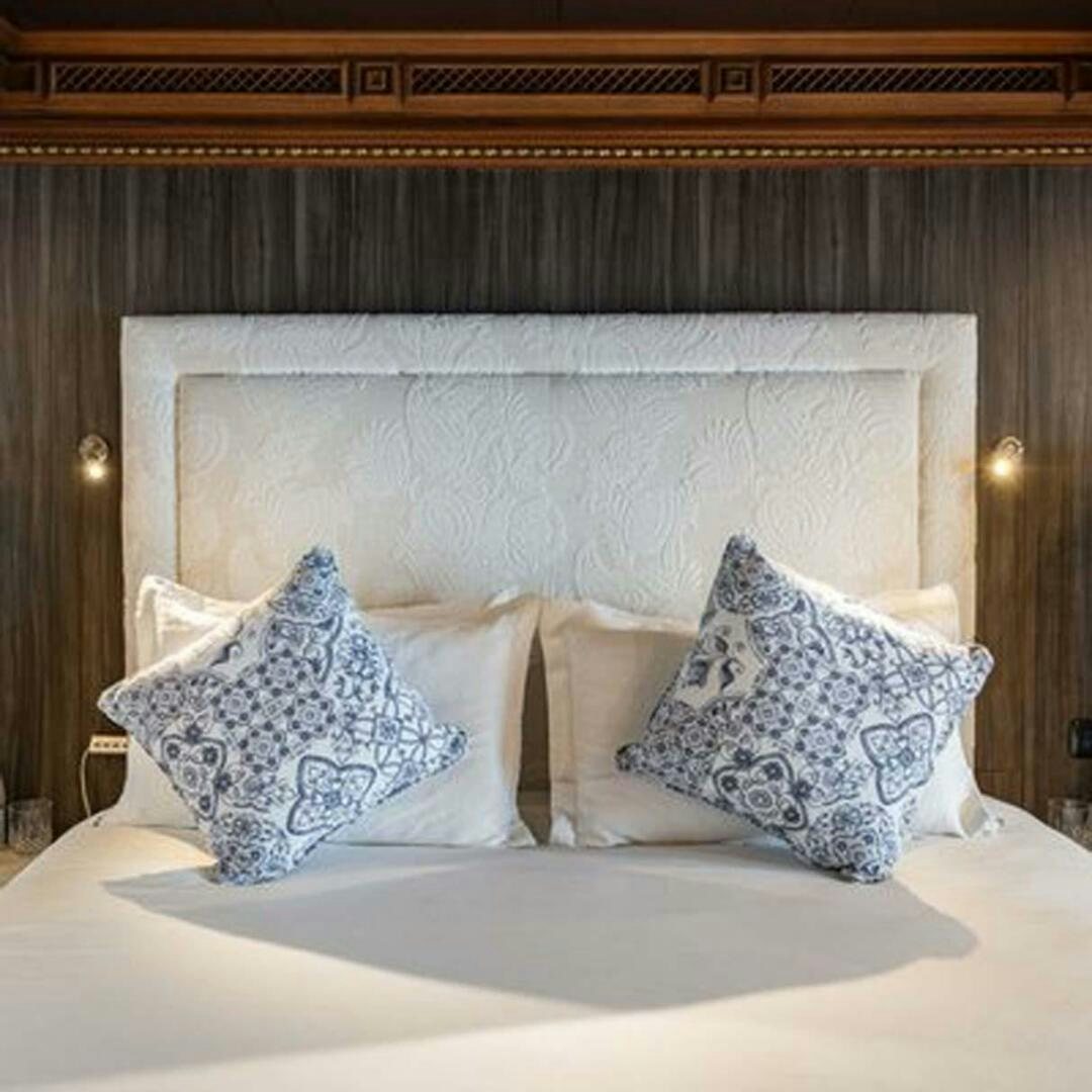 pillows on a bed aboard IRAMA Yacht for Sale