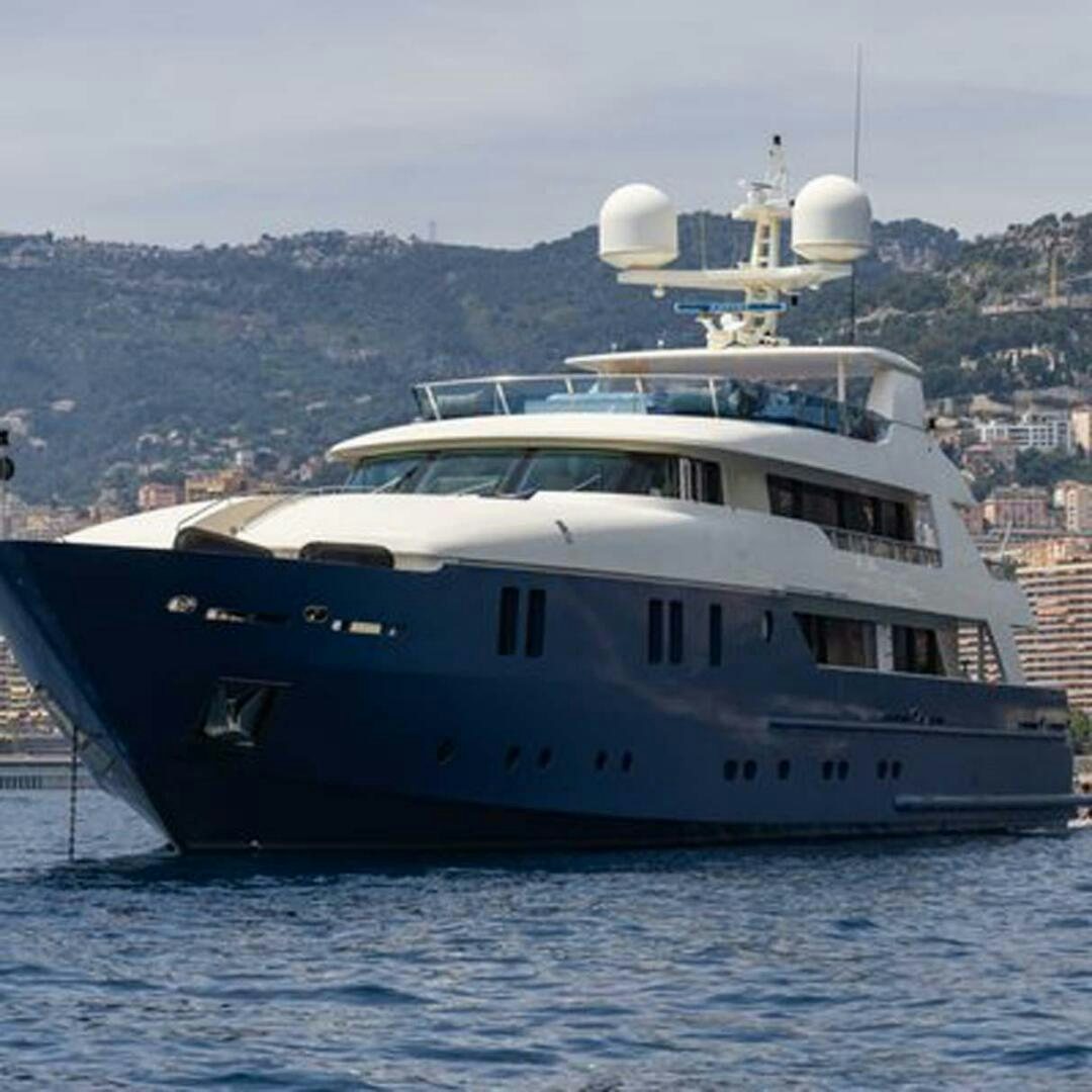 a large white boat in the water aboard IRAMA Yacht for Sale