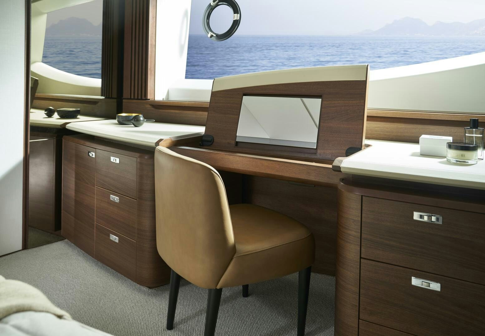 a desk with a computer on it aboard PRINCESS Y80 Yacht for Sale