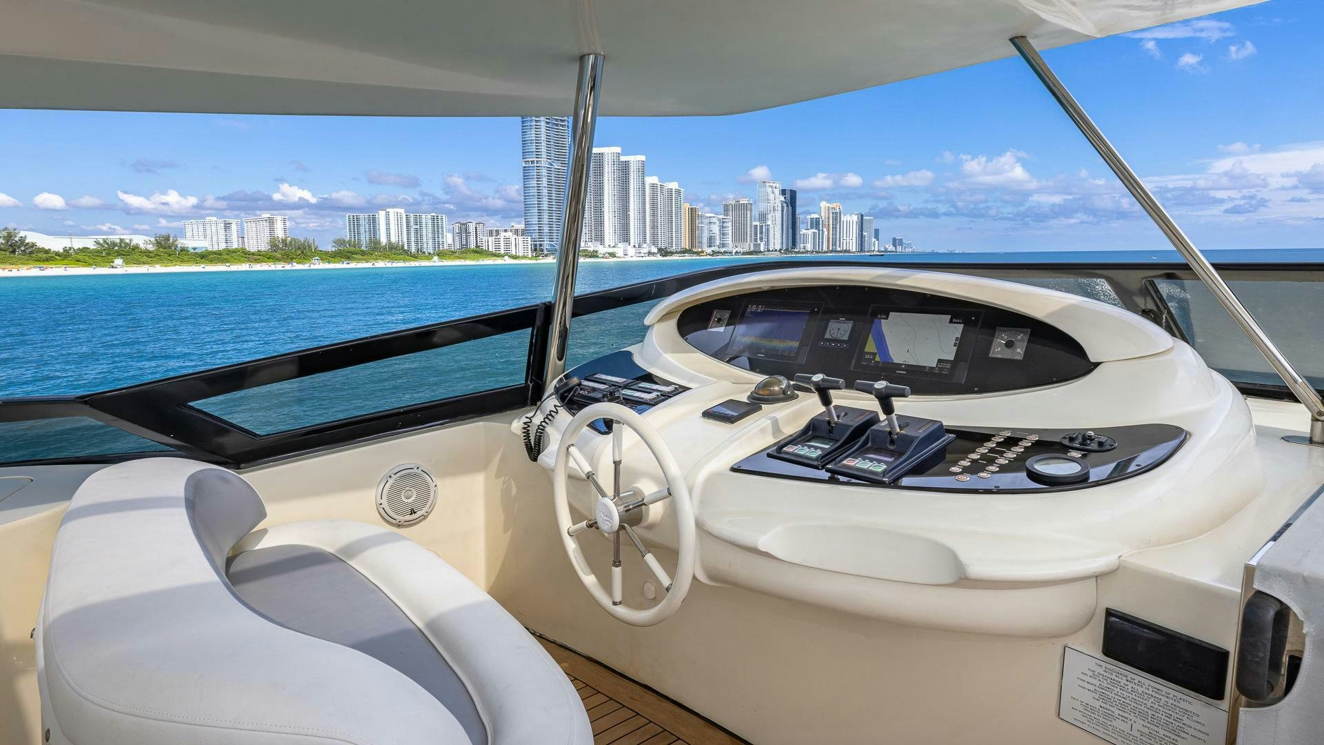 the inside of a car aboard 100 AZIMUT JUMBO Yacht for Sale