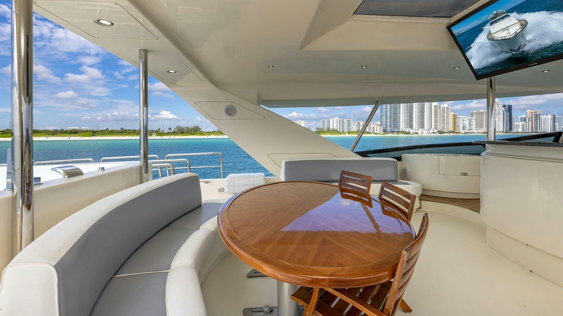 a table on a boat aboard 100 AZIMUT JUMBO Yacht for Sale