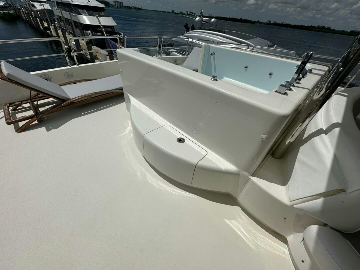 a row of boats on a white surface aboard 100 AZIMUT JUMBO Yacht for Sale