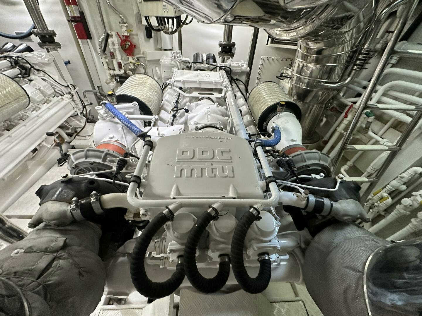 a group of military men working on a machine aboard 100 AZIMUT JUMBO Yacht for Sale