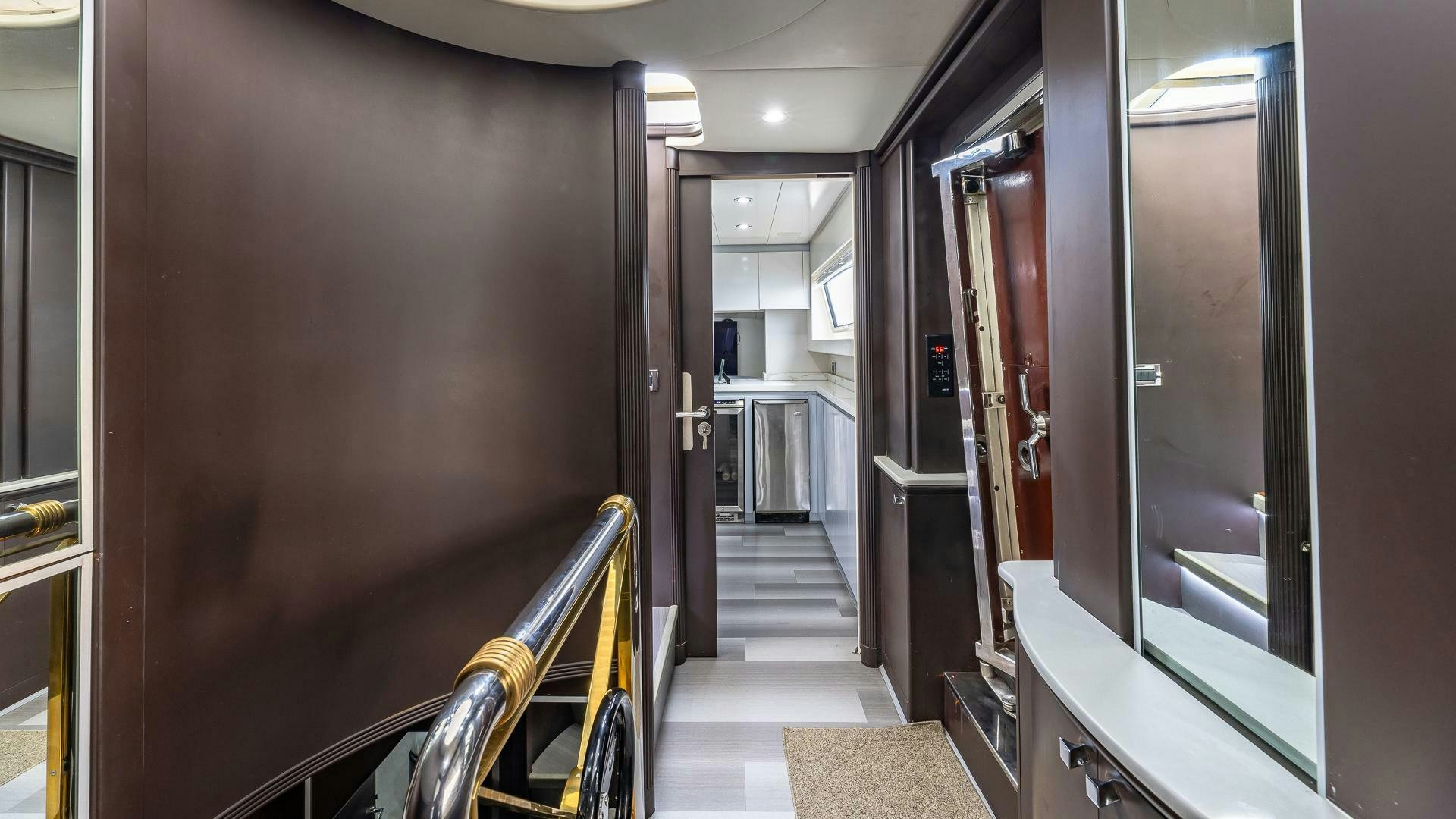 a hallway with doors and windows aboard 100 AZIMUT JUMBO Yacht for Sale