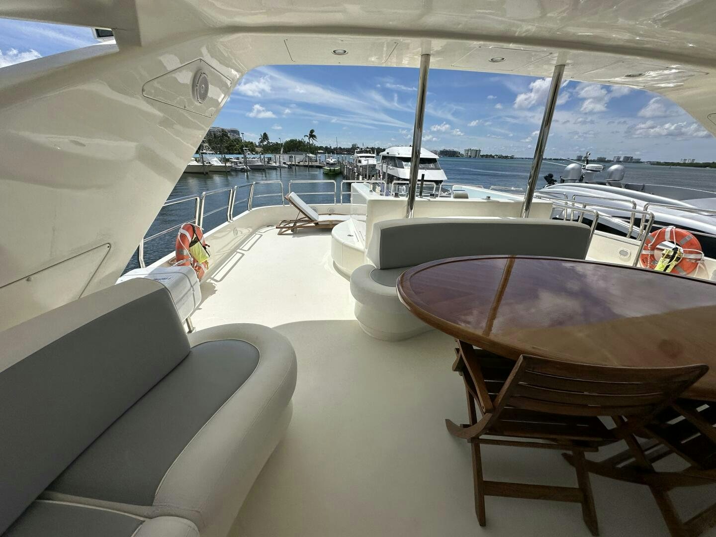 a room with a view of the water and boats aboard 100 AZIMUT JUMBO Yacht for Sale