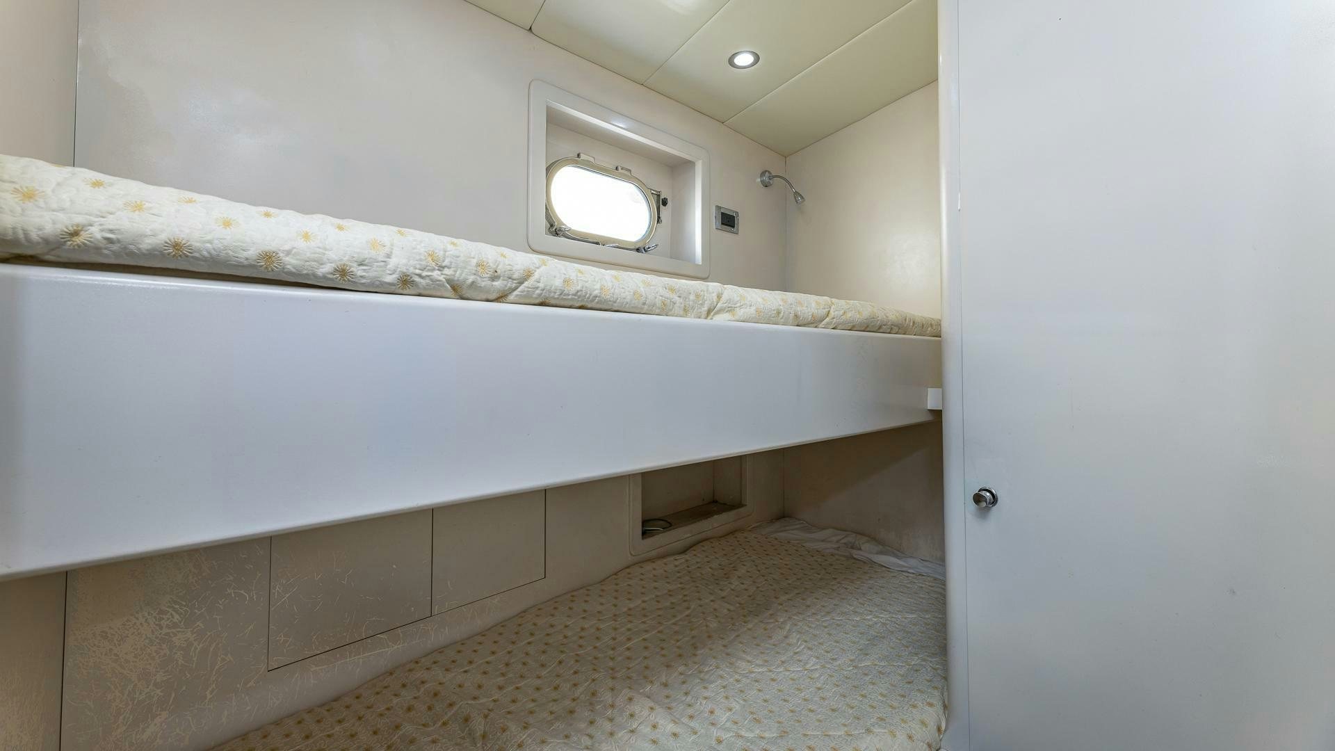 a white room with a window aboard 100 AZIMUT JUMBO Yacht for Sale