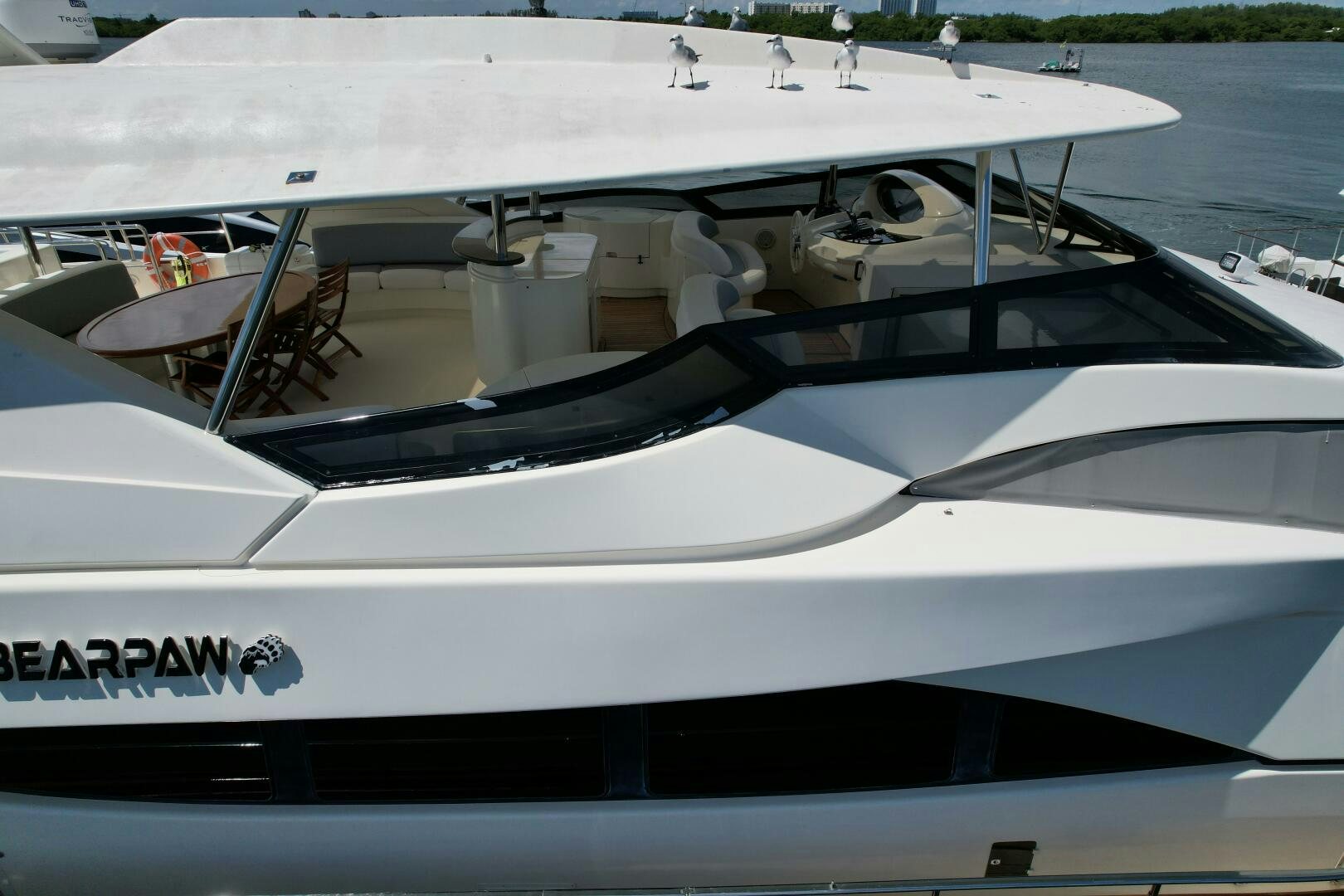 a white yacht on the water aboard 100 AZIMUT JUMBO Yacht for Sale