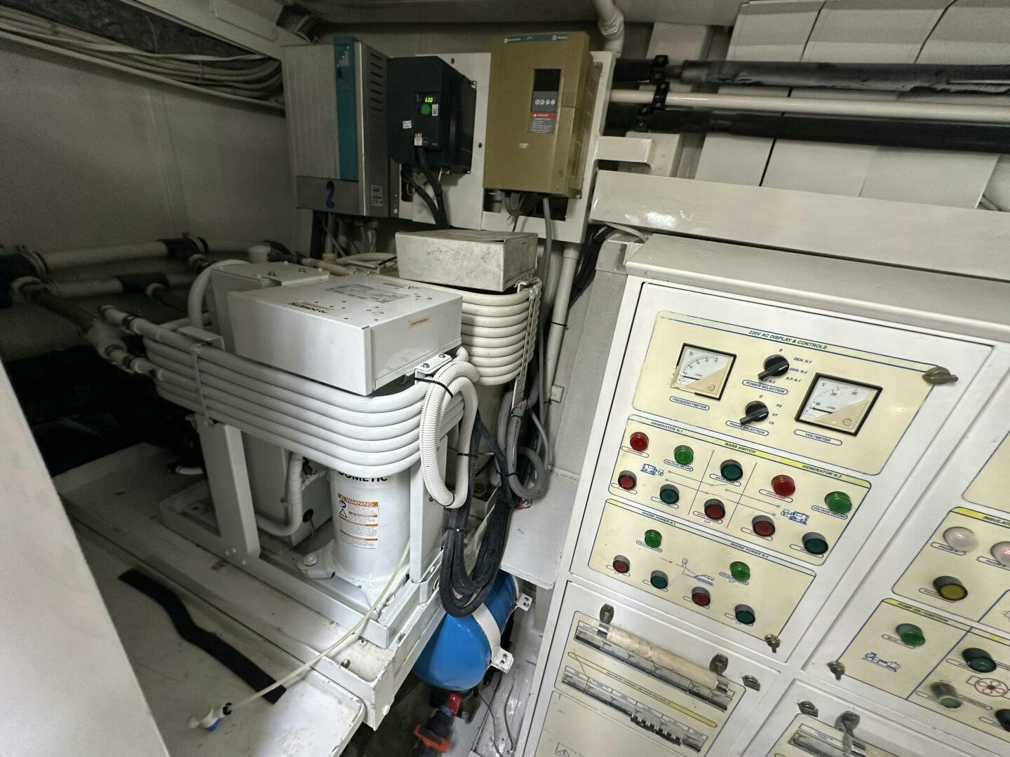 a machine with buttons and switches aboard 100 AZIMUT JUMBO Yacht for Sale
