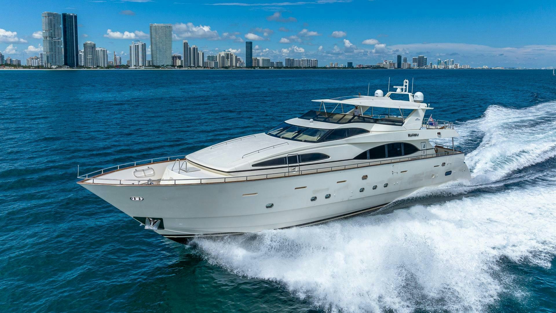 a white yacht on the water aboard 100 AZIMUT JUMBO Yacht for Sale