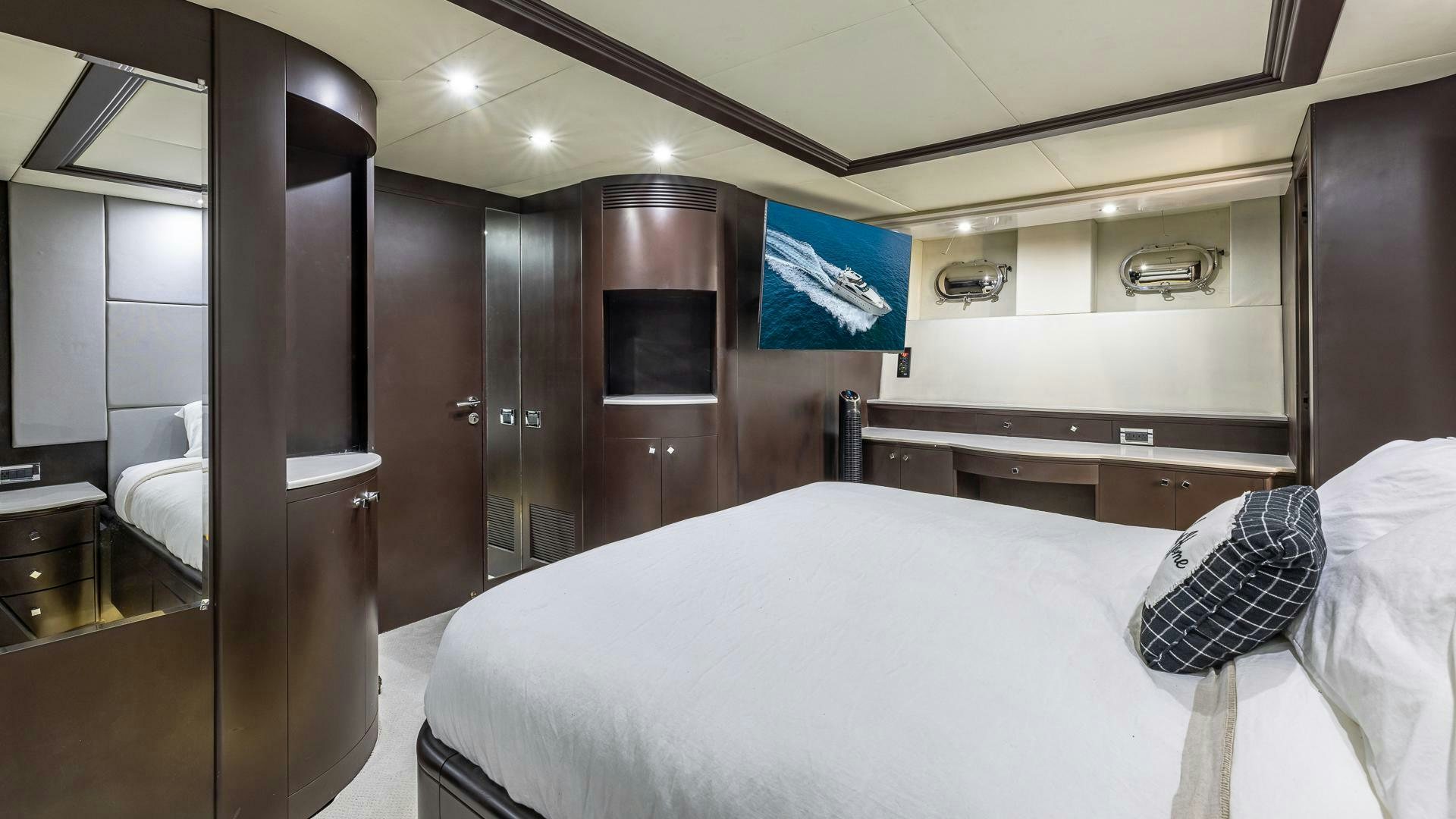 a hotel room with a bed aboard 100 AZIMUT JUMBO Yacht for Sale