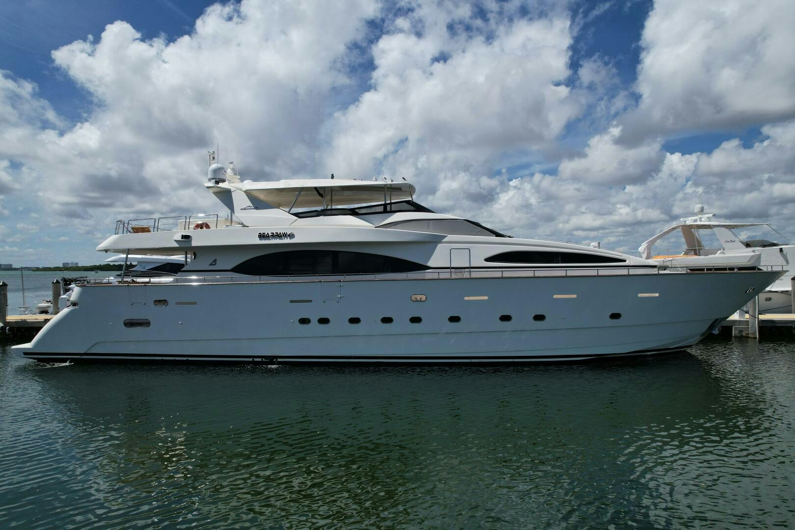 a white yacht in the water aboard 100 AZIMUT JUMBO Yacht for Sale