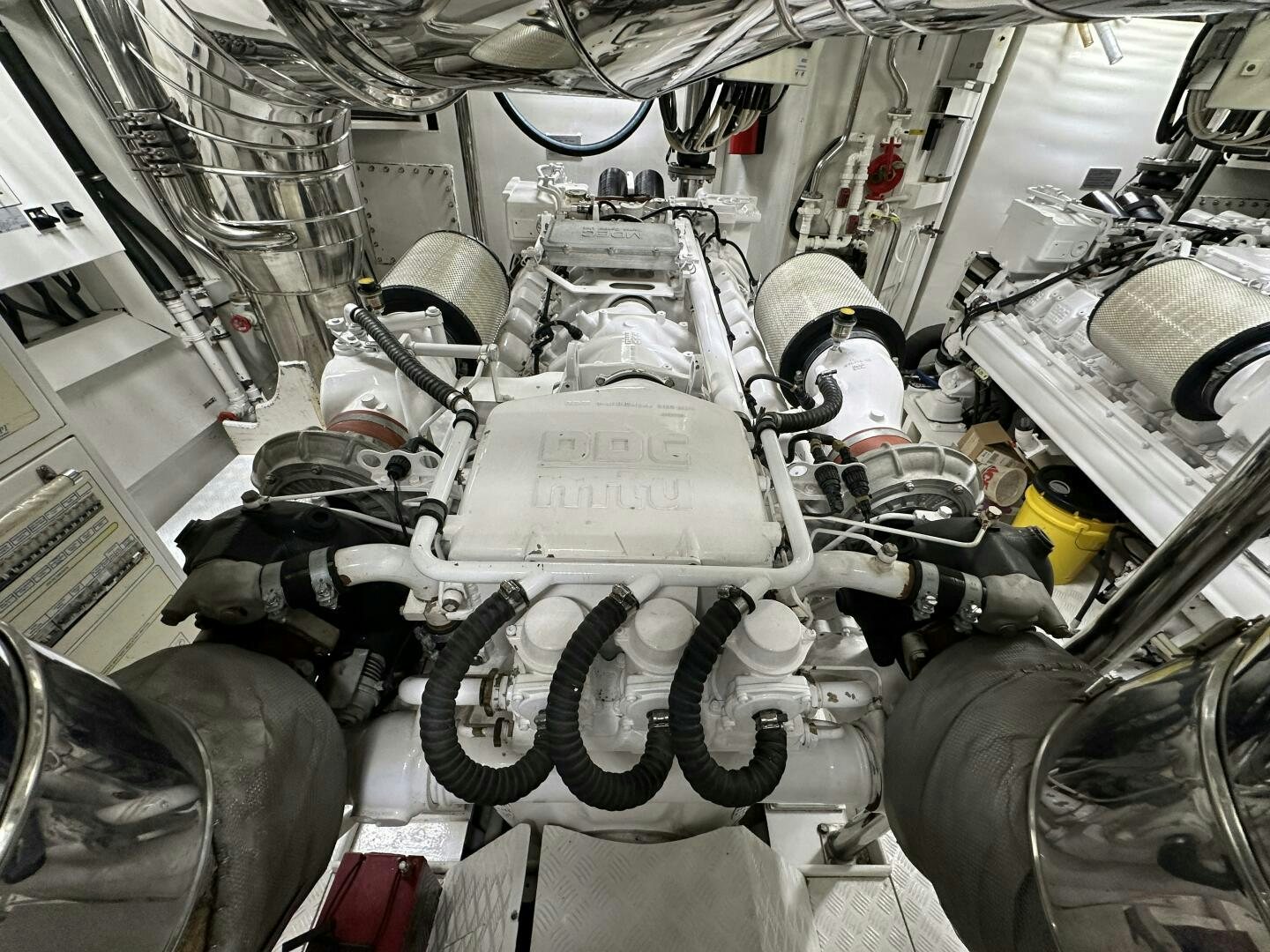 a close-up of a car engine aboard 100 AZIMUT JUMBO Yacht for Sale