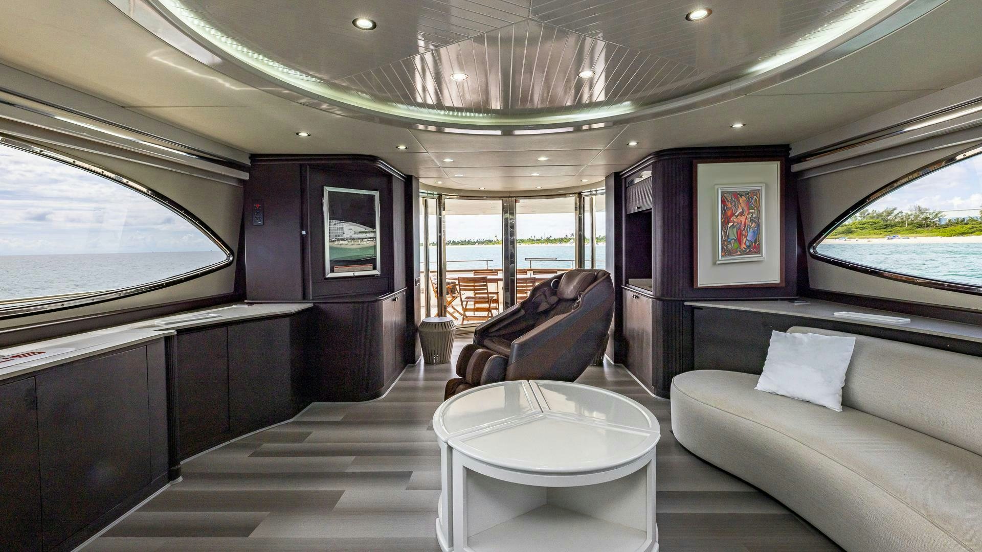 inside of a car aboard 100 AZIMUT JUMBO Yacht for Sale