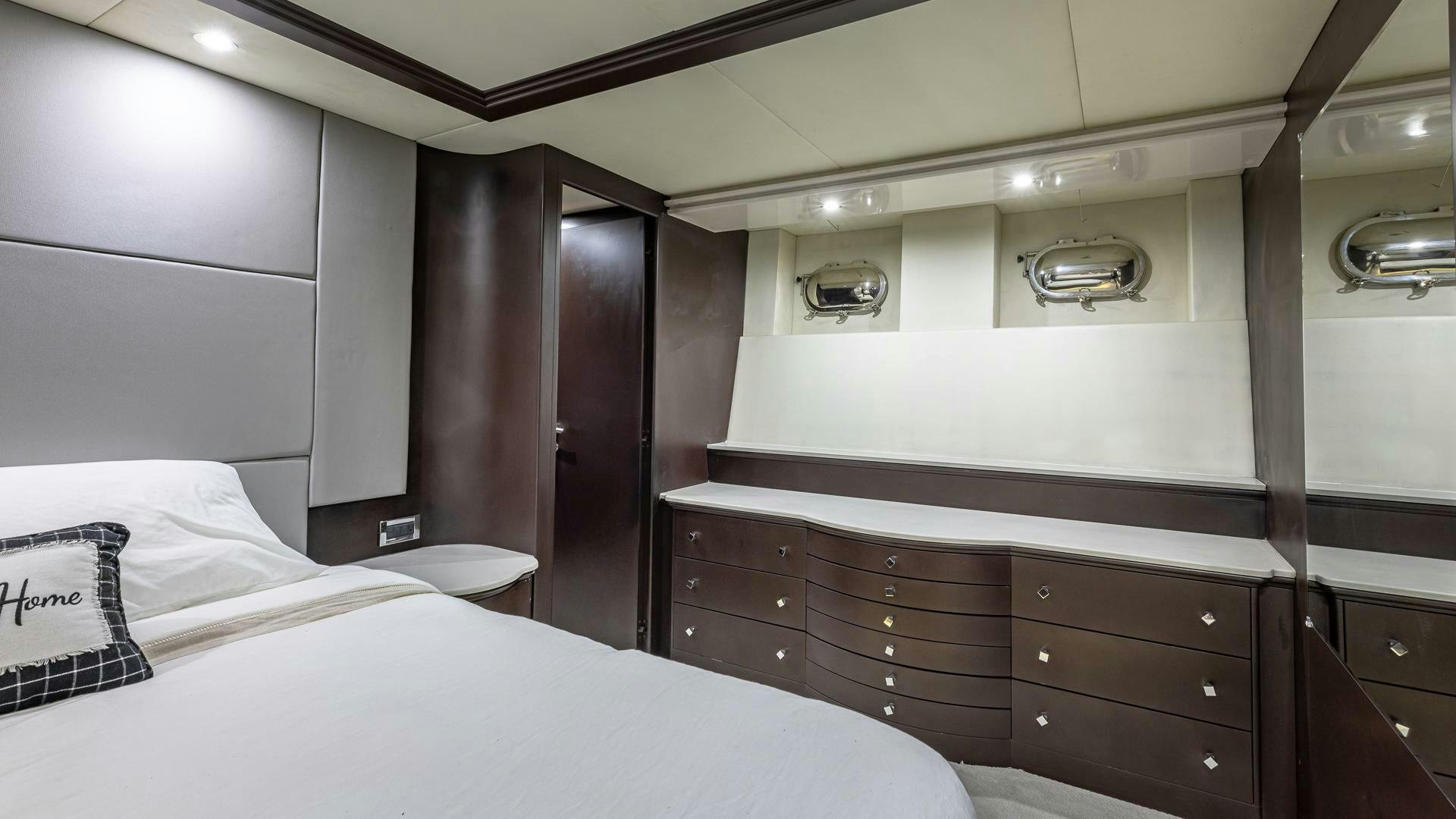 a bed in a room aboard 100 AZIMUT JUMBO Yacht for Sale