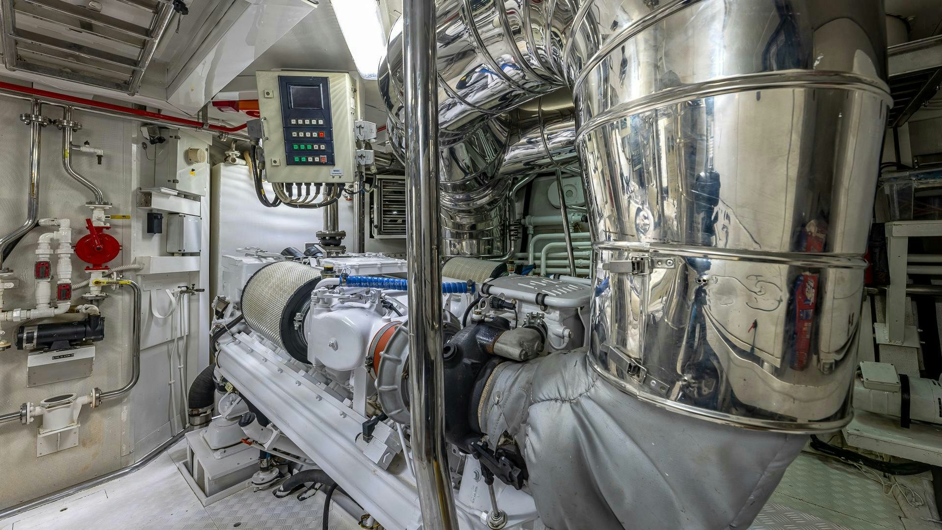 a large machine in a room aboard 100 AZIMUT JUMBO Yacht for Sale