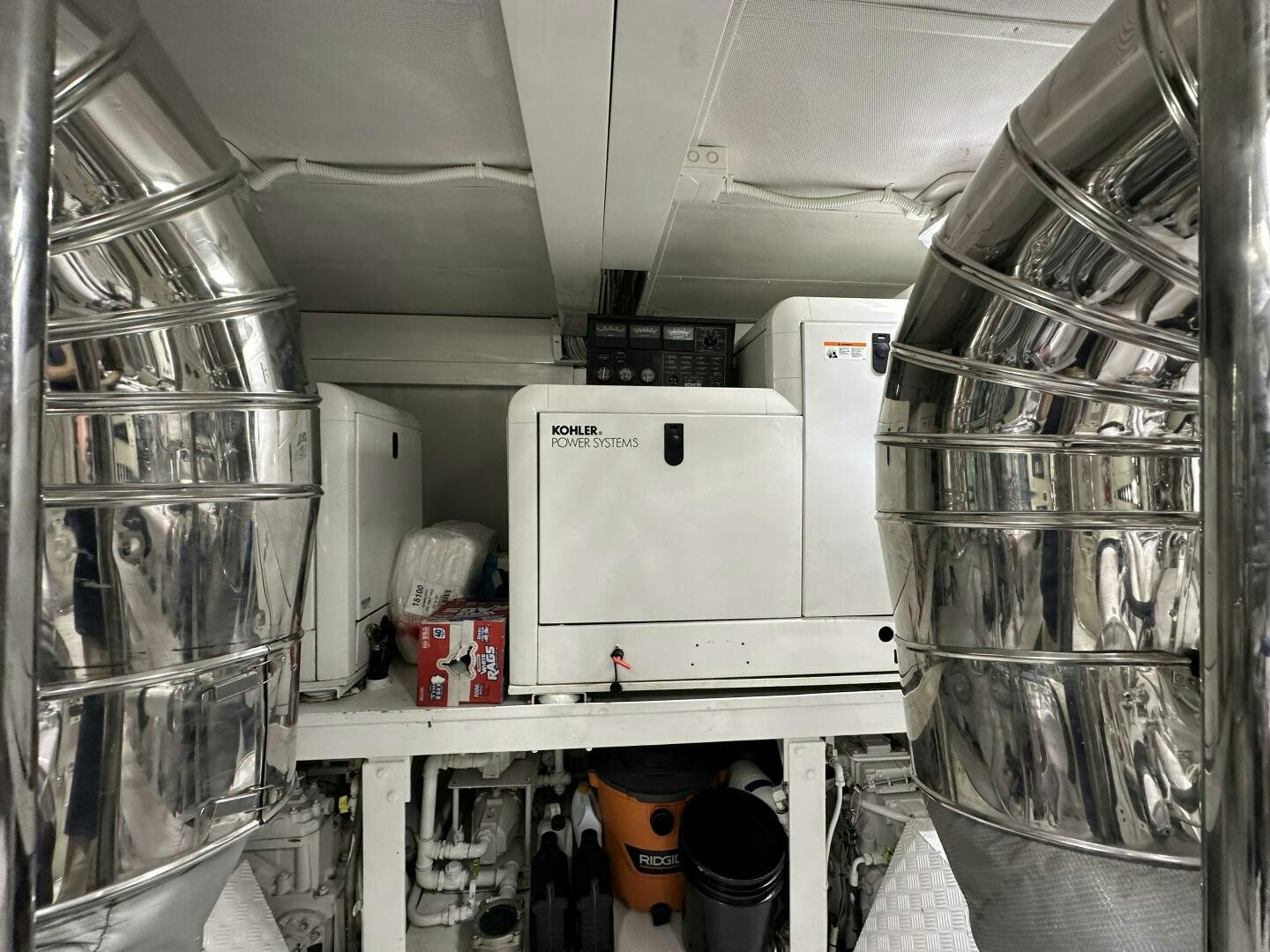 a large white machine in a room aboard 100 AZIMUT JUMBO Yacht for Sale