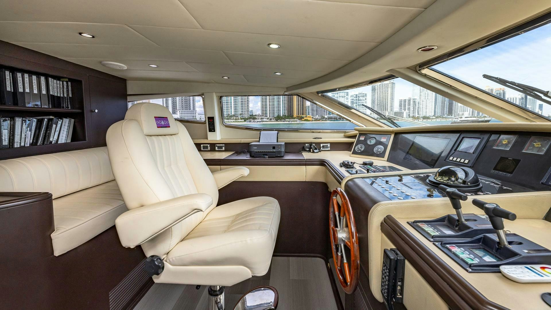 inside of a car aboard 100 AZIMUT JUMBO Yacht for Sale