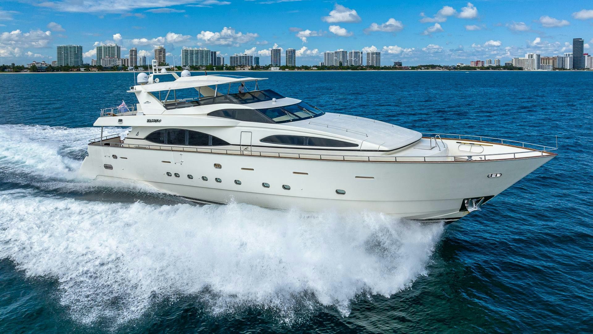 a white yacht on the water aboard 100 AZIMUT JUMBO Yacht for Sale