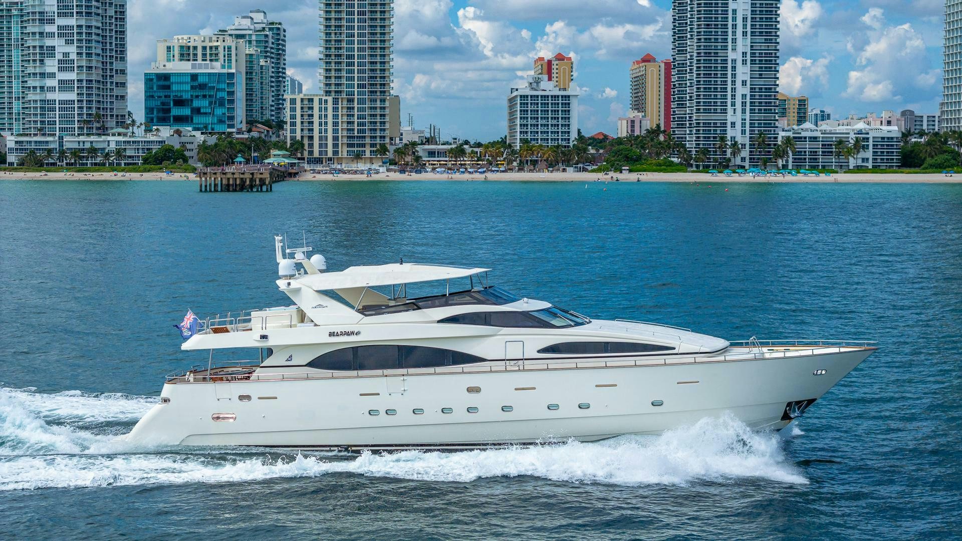 a white yacht in the water aboard 100 AZIMUT JUMBO Yacht for Sale