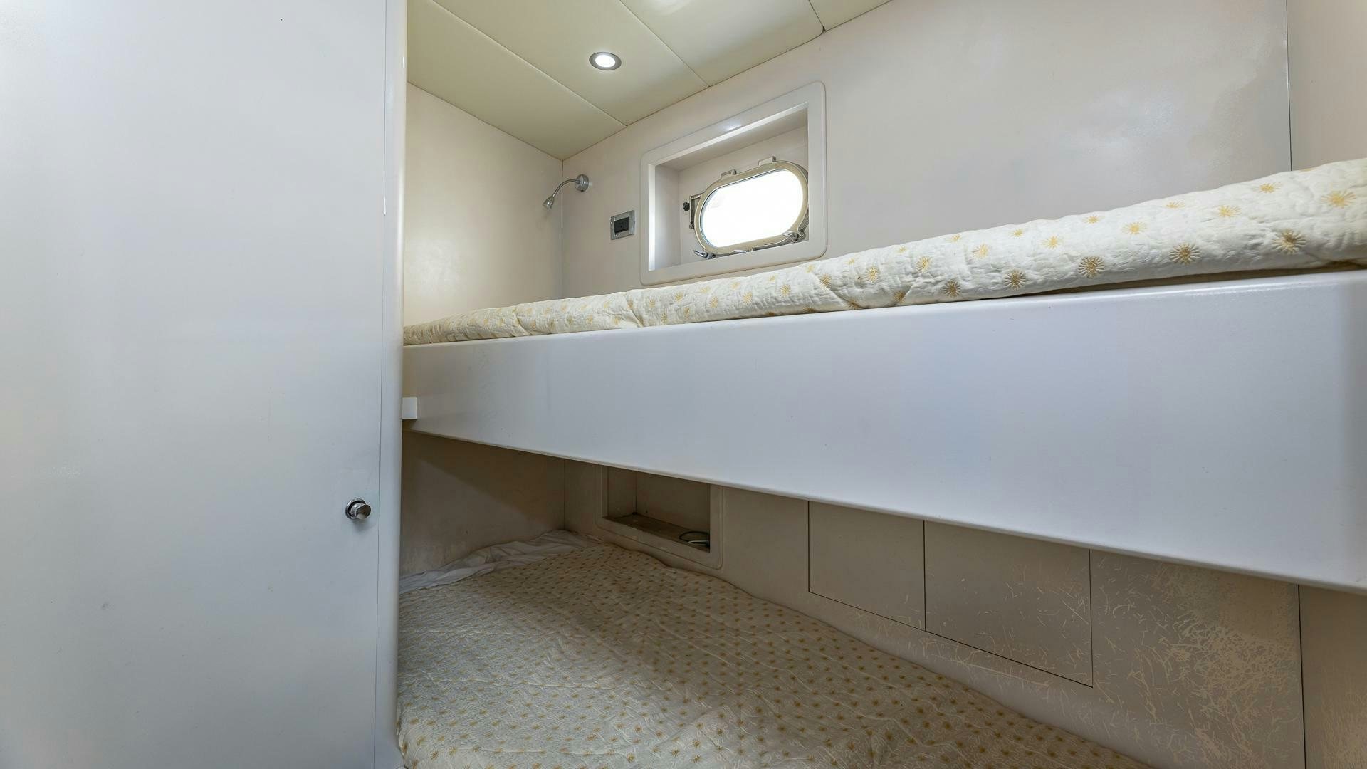 a room with a window and a white wall aboard 100 AZIMUT JUMBO Yacht for Sale