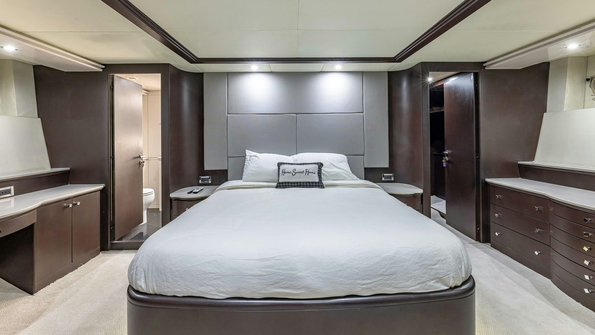 a bed in a room aboard 100 AZIMUT JUMBO Yacht for Sale