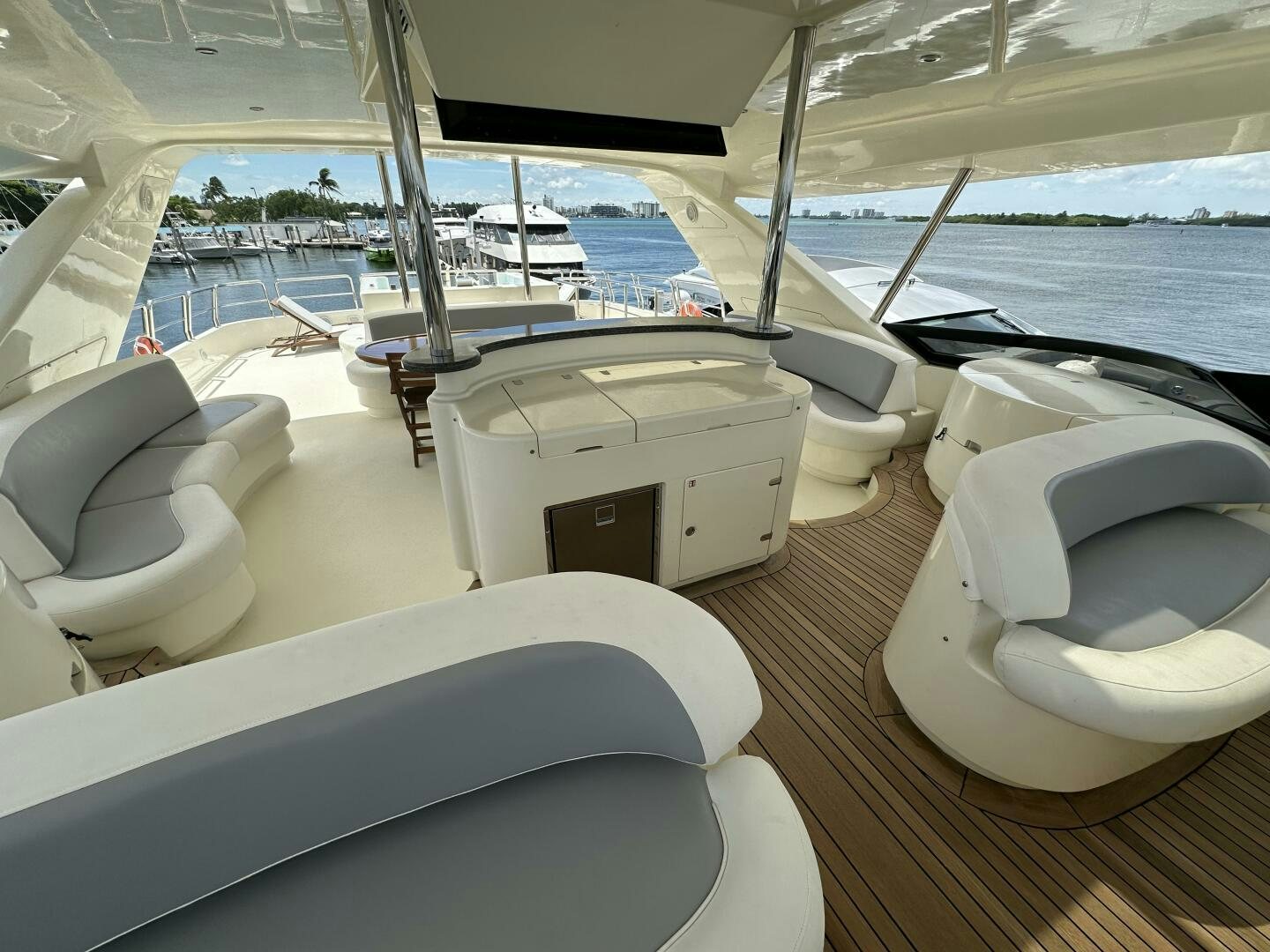 a room with a large window and a view of the water aboard 100 AZIMUT JUMBO Yacht for Sale