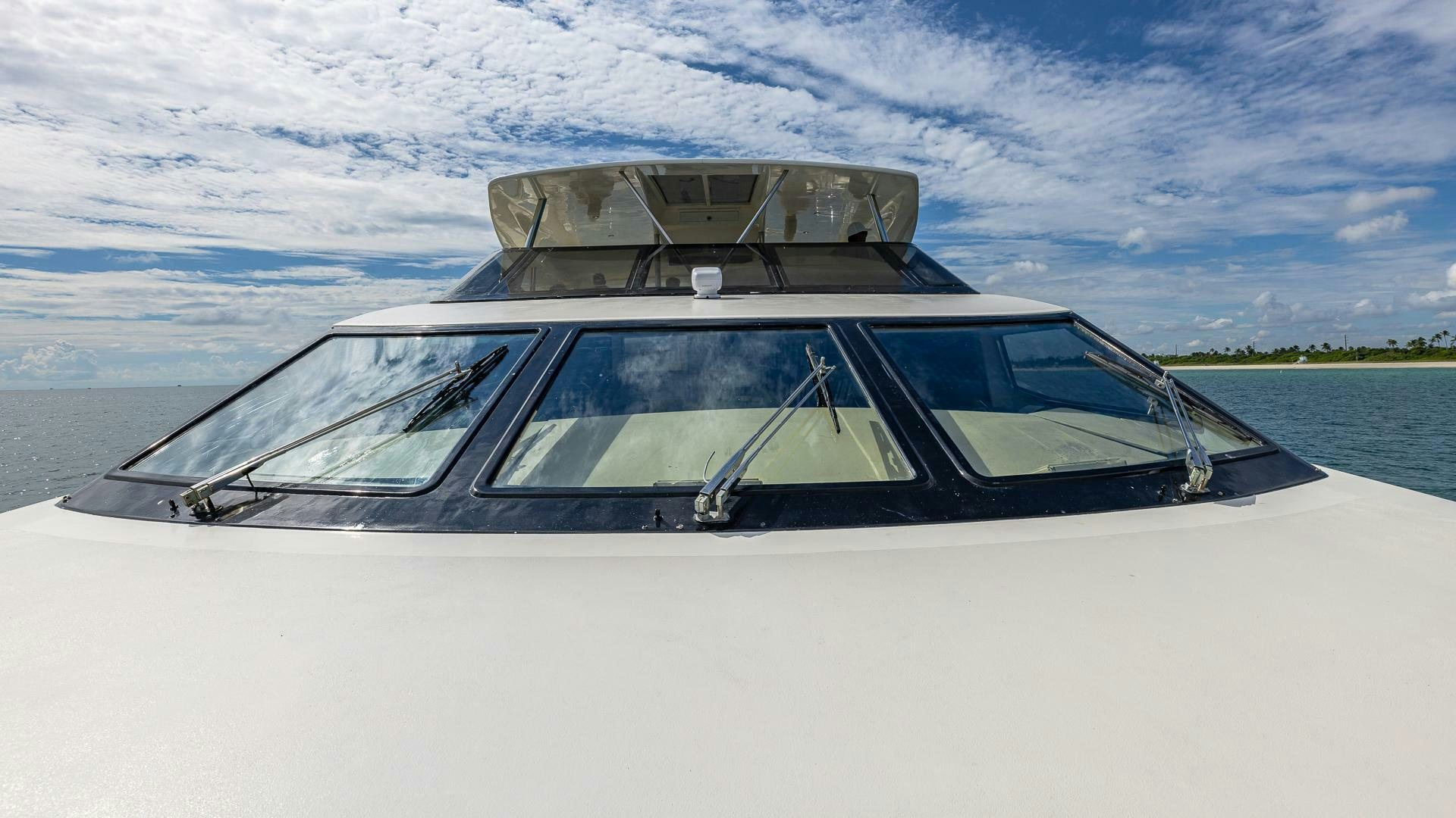 a white car with a door open aboard 100 AZIMUT JUMBO Yacht for Sale
