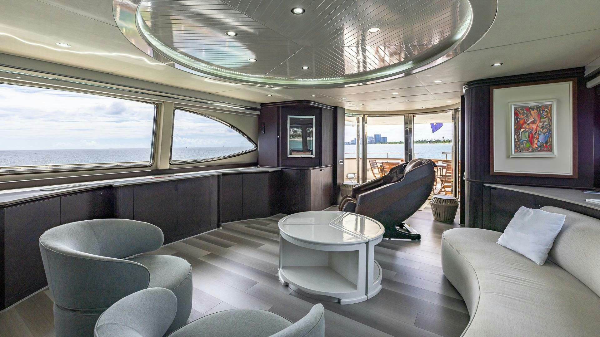 inside of a car aboard 100 AZIMUT JUMBO Yacht for Sale