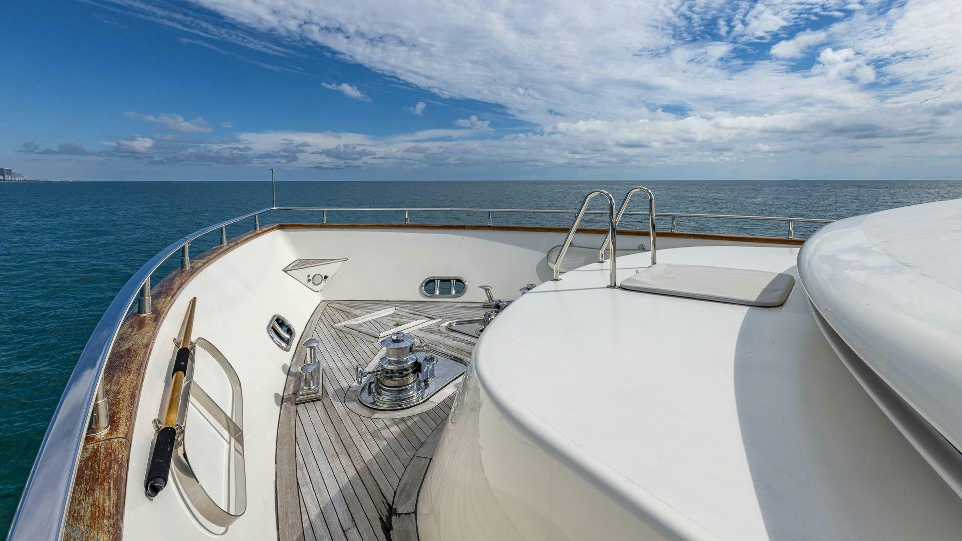 a boat with a metal railing and a railing over the water aboard 100 AZIMUT JUMBO Yacht for Sale