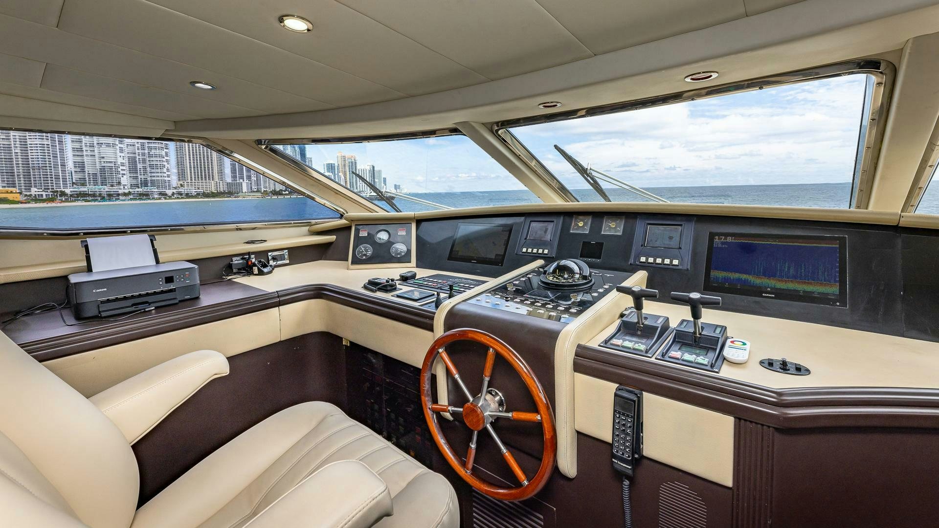 inside of a car aboard 100 AZIMUT JUMBO Yacht for Sale