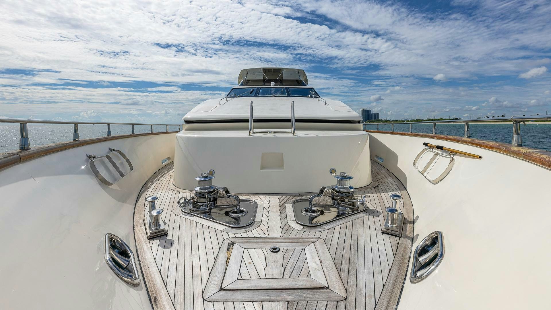 a white boat on a deck aboard 100 AZIMUT JUMBO Yacht for Sale