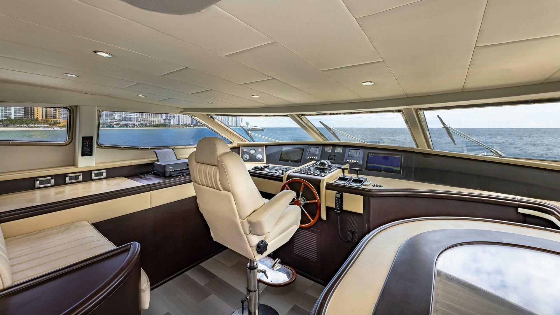 inside of a car aboard 100 AZIMUT JUMBO Yacht for Sale