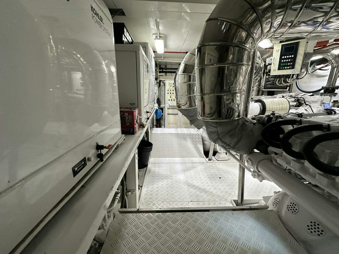 a large machine in a room aboard 100 AZIMUT JUMBO Yacht for Sale