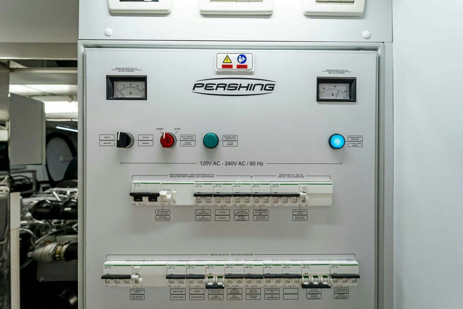 a white computer with a blue light aboard G Yacht for Sale