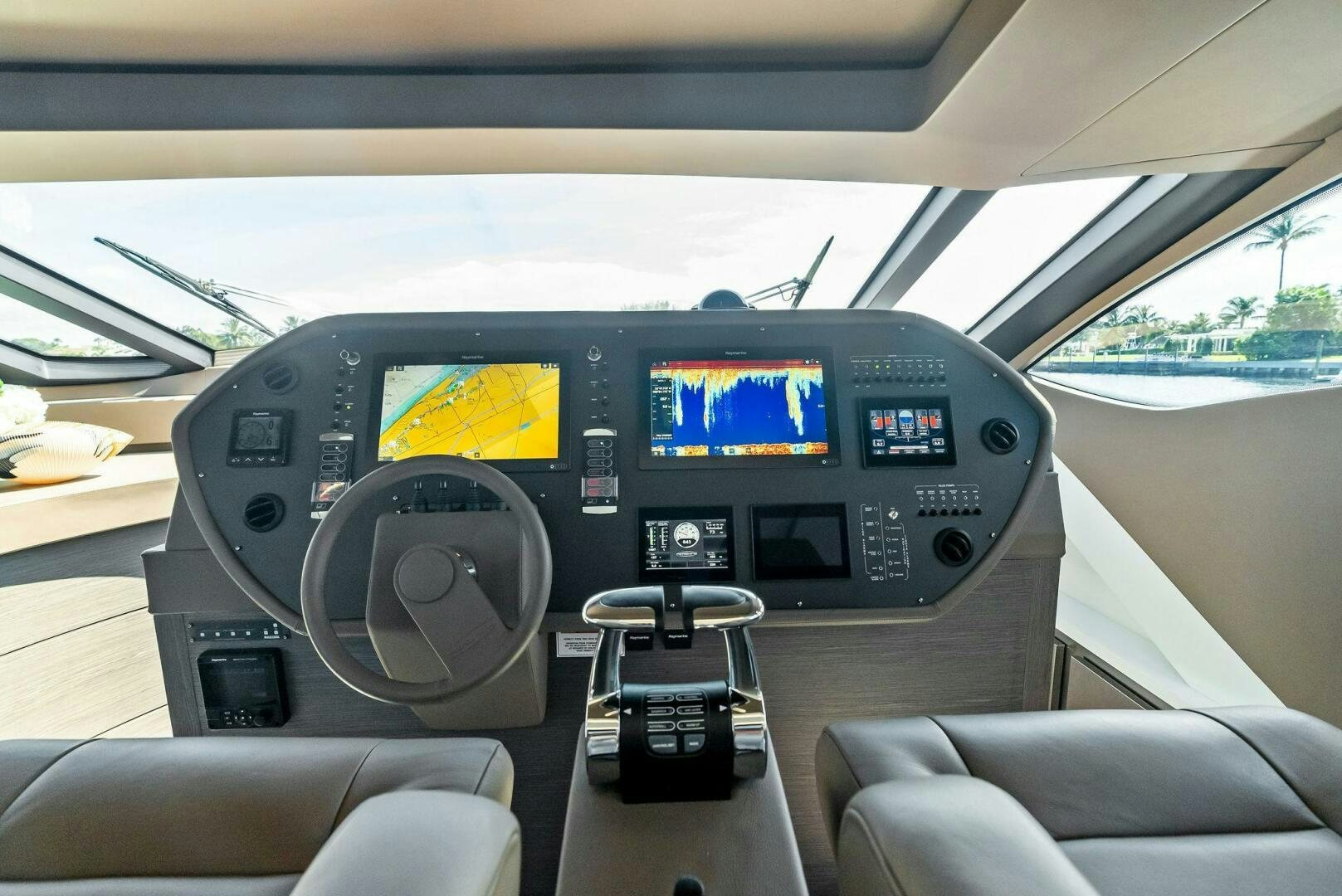 inside of a car aboard G Yacht for Sale