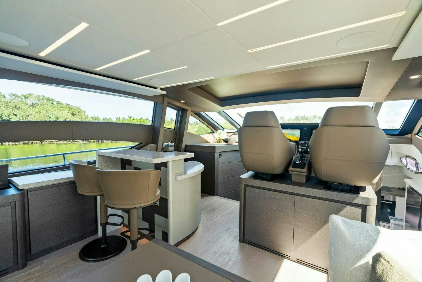 an empty office with a large window aboard G Yacht for Sale