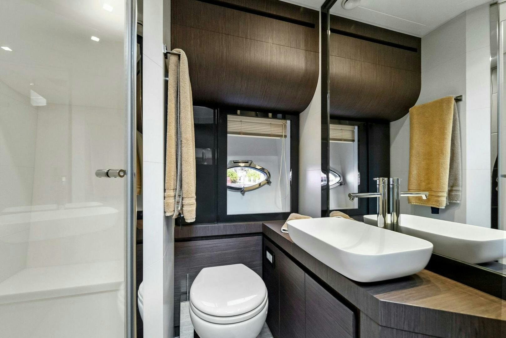 a bathroom with a sink and toilet aboard G Yacht for Sale
