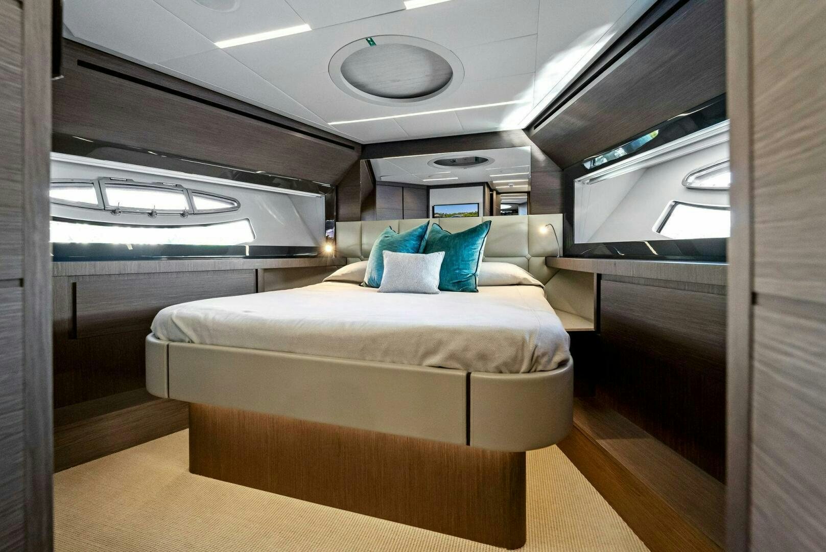 a bed in a room aboard G Yacht for Sale